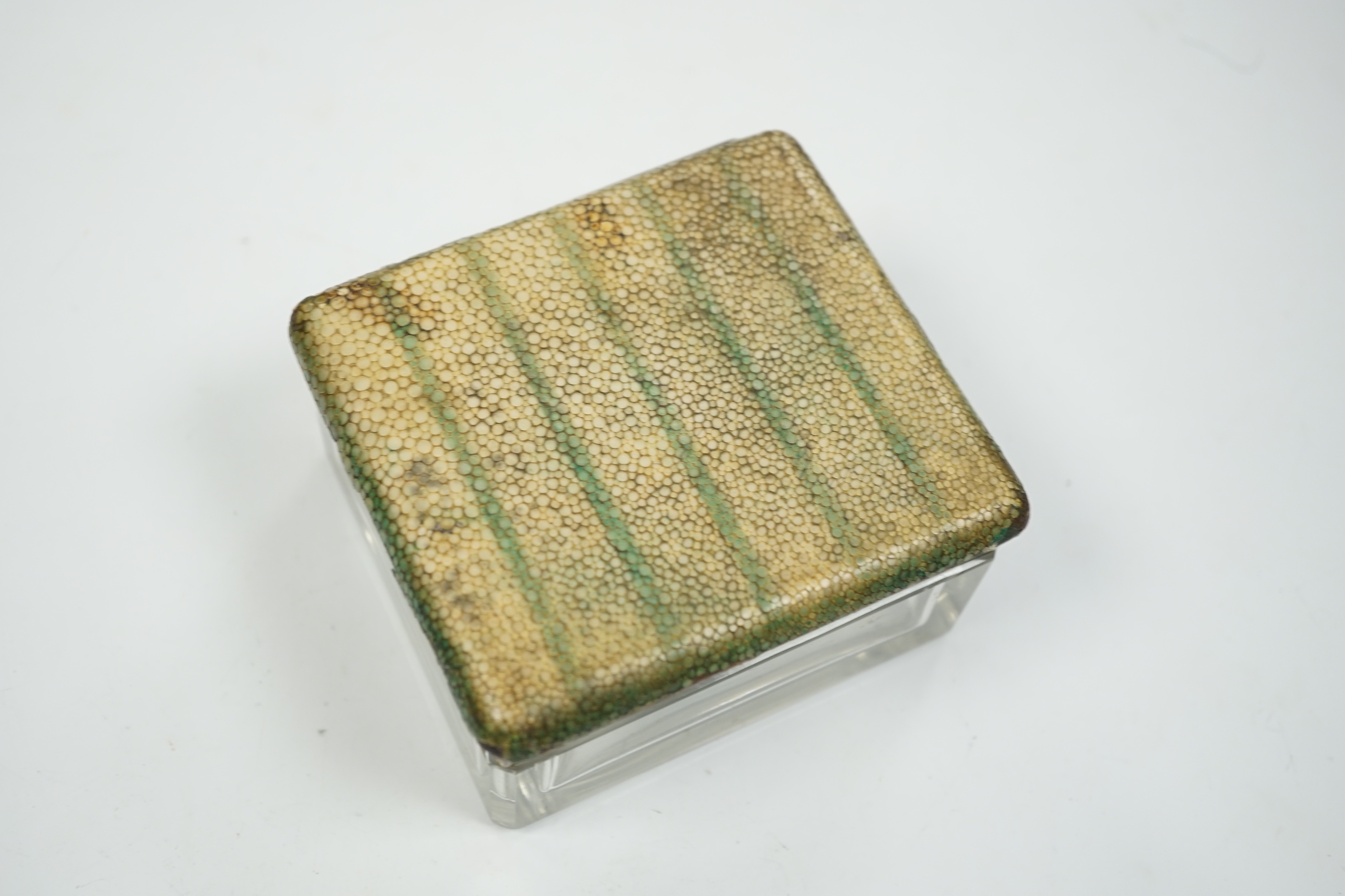 A George V silver and shagreen mounted glass square toilet box, with hinged cover, by George Betjemann & Sons Ltd, London, 1927, retailed by Asprey, London, width 94mm.